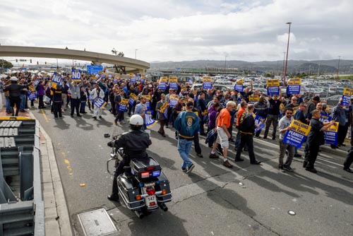 United Airlines Teamsters take to the street on their lunch break on February 19 to protest a company-forced concessionary proposal.