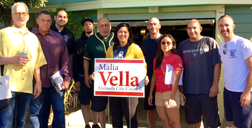 Teamsters 856 Staff Attorney Malia Vella on the campaign trail. Vella won her election and will be sworn in as Alameda's Vice Mayor later this month.